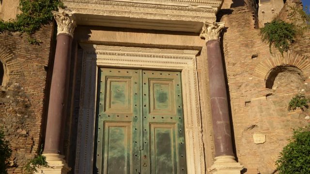 The green door of the Temple Romulus at the Roman Forum in Rome, Italy
