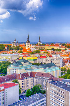 Cityscape View of Tallinn City on Toompea Hill in Estonia. Shot Covers Lines of Traditional Red Roofs of Medieval Houses, Towers, Cathedral and Churches