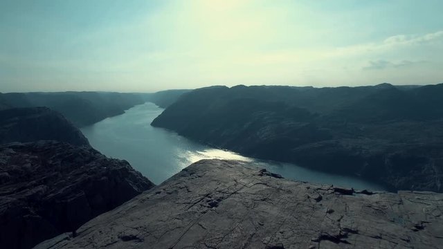 Norway epic Preikestolen cliff edge aerial fly over.