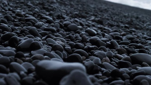 black pebbles and reynisdrangar in Iceland
