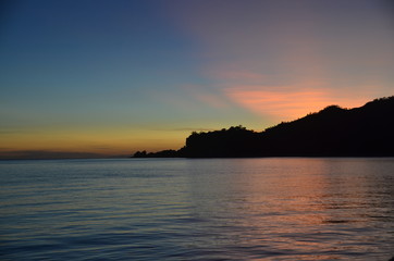Fototapeta premium Sunrise over the enclave of Oecussi, part of the Republic of Timor Leste (East Timor).