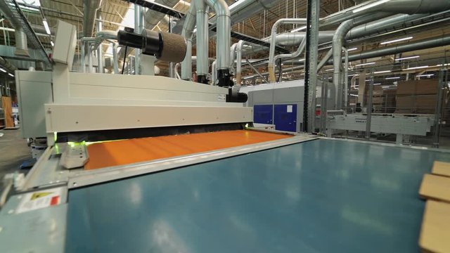 Manufacture of flooring, parquet processing. Modern industrial factory