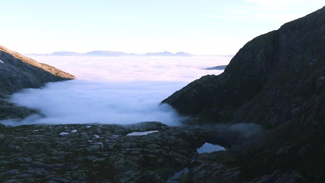 Camping spot above the clouds in Norway, woke up at 5am to be treated with this timelapse.