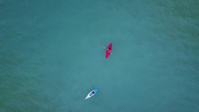 Rising up from Kayaks near shore