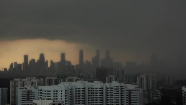 Timelapse of skyline with incoming storm Singapore Asia