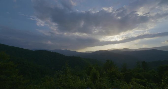 a time lapse of the clouds in the mountains