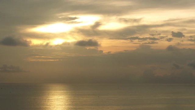 Timelapse of sunset into ocean horizon