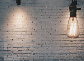 Soft focus Antique lamp Old and white brick wall for empty space in my home. Vintage style and...