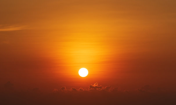 Fototapeta scenic of sunrise from cloud pattern and golden sky