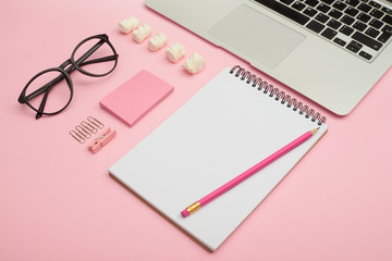 Beautiful workspace arrangement with laptop and other business a