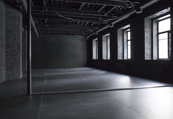 Empty room of black brick