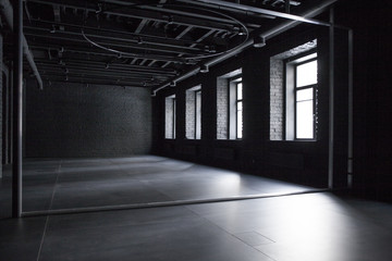 Empty room of black brick