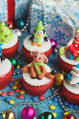 Christmas cupcakes with colored decorations