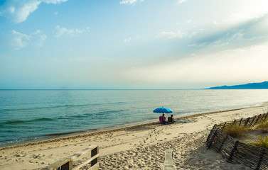 Fototapeta na wymiar Seascape with beach umbrella
