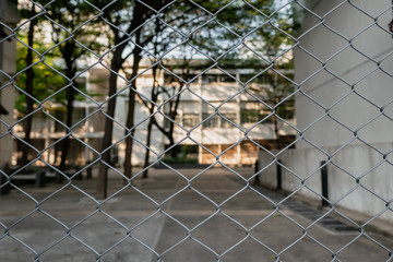 Chain link fence in front of the building
