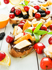 Toasts with chocolate and fruits