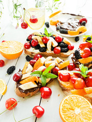 Toasts with chocolate and fruits