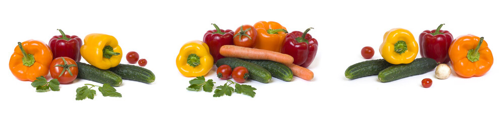 Obraz na płótnie Canvas Panoramic view of the red yellow and orange peppers with tomatoes on a white background..Cucumbers with colorful peppers in composition on a white background.