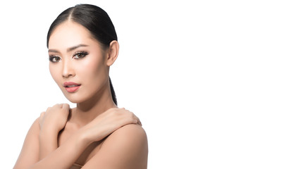 Fototapeta premium Beauty shot of young pretty asian woman with clear skin ongrey background, for skin ad and cosmetology with copy space for text insertion