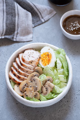 Chicken salad with leaf vegetables, mushroom and eggs