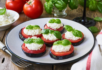 Fried eggplants with tomatoes and cottage cheese         