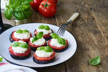 Fried eggplants with tomatoes and cottage cheese         