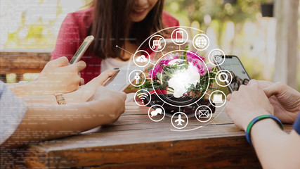 Hands of people use smartphone for connecting to various application, internet of things conceptual