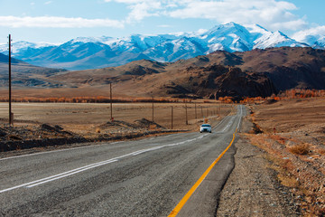 Landscape with beautiful empty mountain road. Travel background. Highway at mountains.