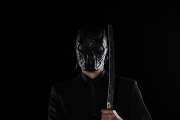 man in a scary mask for Halloween