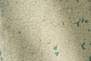 Close-up detail of cracked paint on wall.