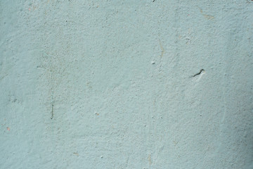 Close-up detail of cracked paint on wall.