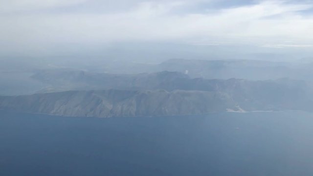 flying over Vlora in Albania. Aerial view of city and adriatic Sea.