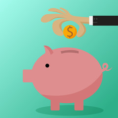 Hand putting coin a piggy bank money savings concept.