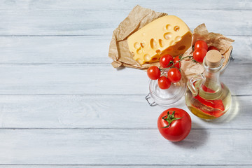 Healthy foods, cooking concept, summer vegetables, culinary ingredients, place for text on wooden rustic background. Top view with copy space