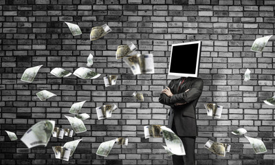 Businessman with monitor instead of head.