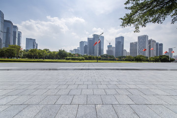 Panoramic skyline and modern business office buildings with empty road,empty concrete square floor