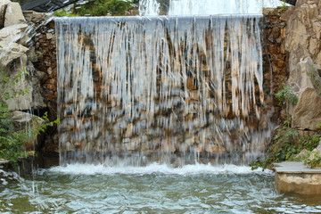 Cascade of decorative waterfall of the fountain in a park in Pyatigorsk, Russia