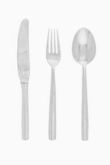 Set of cutlery, spoon fork and knife made of silver isolated on white background with clipping path