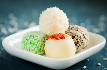 appetizing truffles on a wooden background