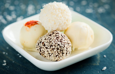 appetizing truffles on a wooden background