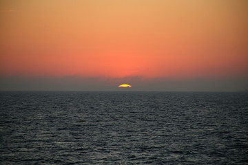 The sun falls into the Ocean. 002. 