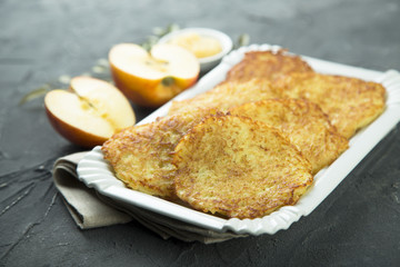 Potato pancakes, or latkes with apple sauce