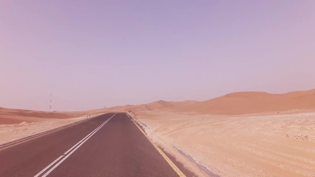 New road from Oasis Liwa to Moreeb Dune in Rub al Khali desert stock footage video