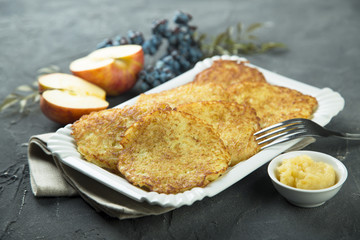Potato pancakes, or latkes with apple sauce