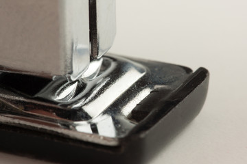 stapler for stapling papers on a table