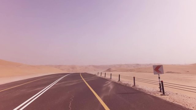 New road from Oasis Liwa to Moreeb Dune in Rub al Khali desert stock footage video