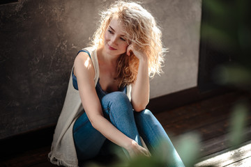 Fototapeta na wymiar Close-up portrait of sweet blonde woman in a casual jeans clothes, fashion beauty photo
