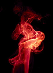 Fototapeta premium Red smoke on black background