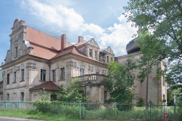 Fototapeta na wymiar Decaying baroque palace in Turawa from the eighteenth century. The last extension and renovation was carried out in 1847 by the then owner of Count Karl von Garnier. Turawa, Opole province, Poland, Eu