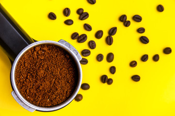 ground coffee and coffee beans, top view